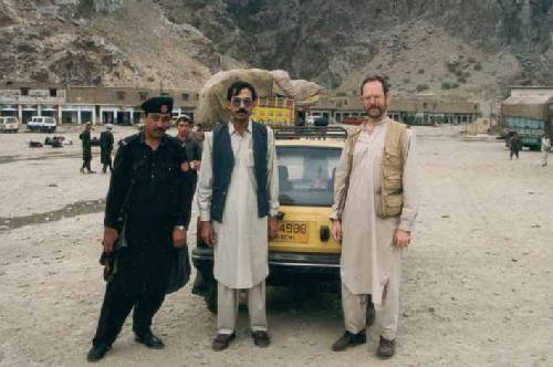 In the Khyber Pass going from Pakistan into Afghanistan, with guard and trainee nurse.  Oct. 95
