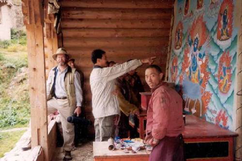 at the Dutsi Til Monastery in a remote part of Kham, with translator/master Thangka painter Jamyang Singye, and a resident monk.  Sept. 99